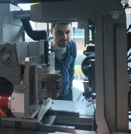 Federico working with the Wittmann Battenfeld MicroPower 15 micro injection moulding machine used in his experiments.