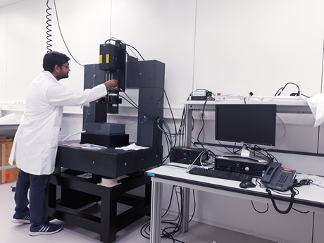 Krishna tuning his newly developed prototype setup of hybrid laser-electrochemical micromachining